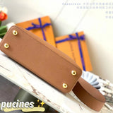 Handle and strap detail of premium signature women's handbag – women's designer-style accessory