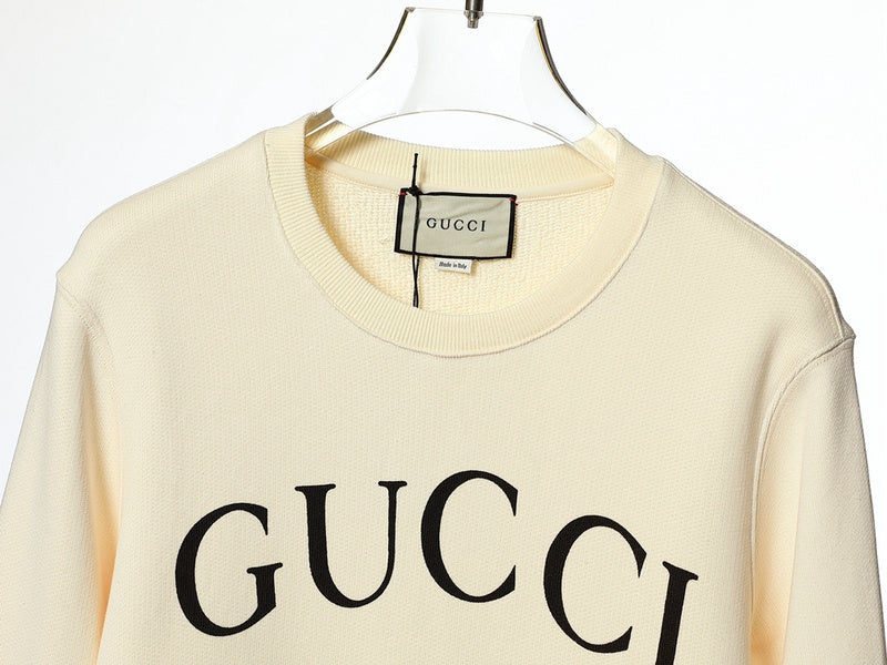 Close-up detail shot of Gucci luxury clothing with tailored silhouette