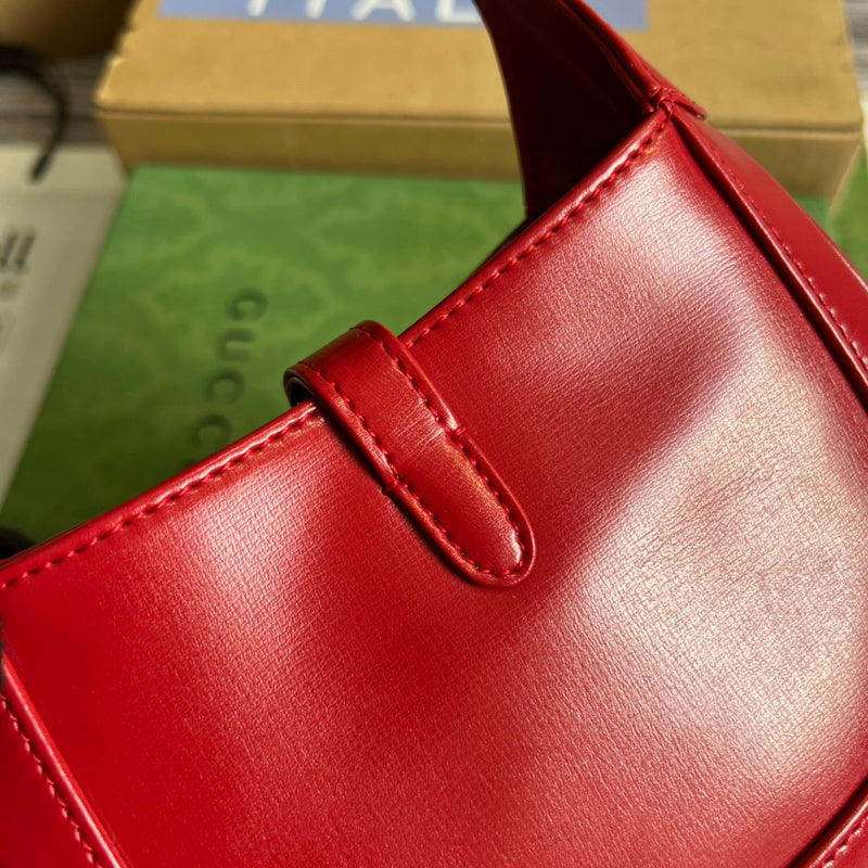 Styled lifestyle shot of refined polished women's handbag – women's luxury handbag