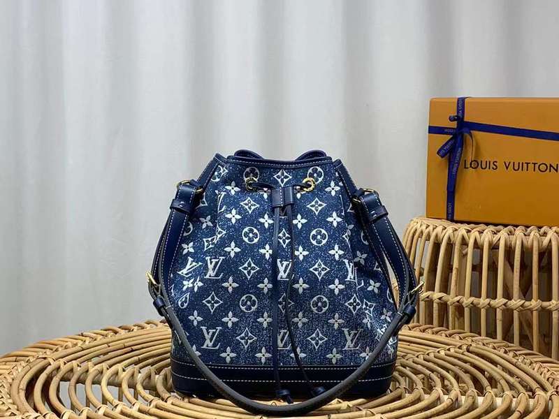 Side profile of sleek structured women's handbag – women's statement bag