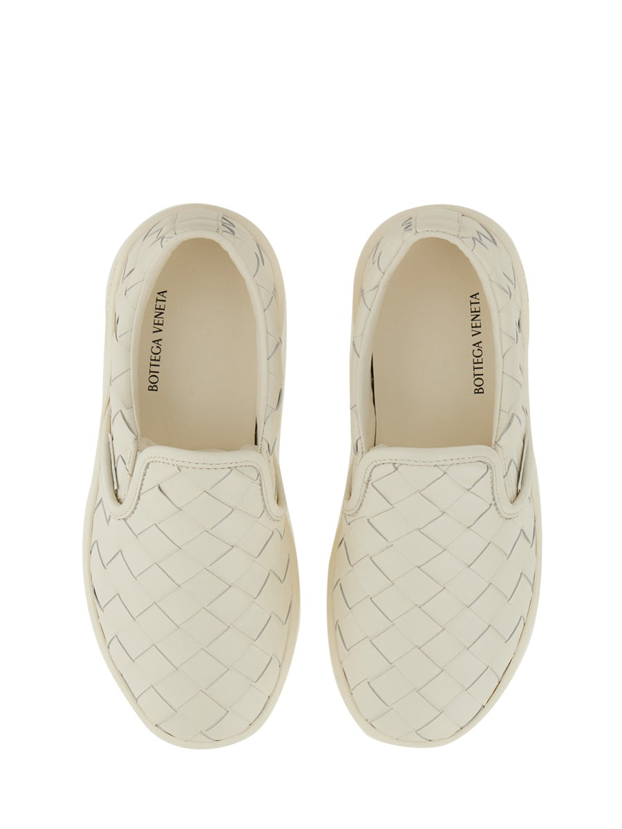 Close-up of Bottega Veneta athletic hardware and fine stitching