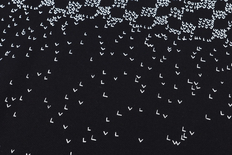 Close-up detail shot of Louis Vuitton luxury clothing with runway-inspired design