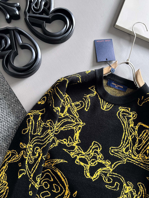 Flat lay presentation of Louis Vuitton luxury clothing with label-forward styling