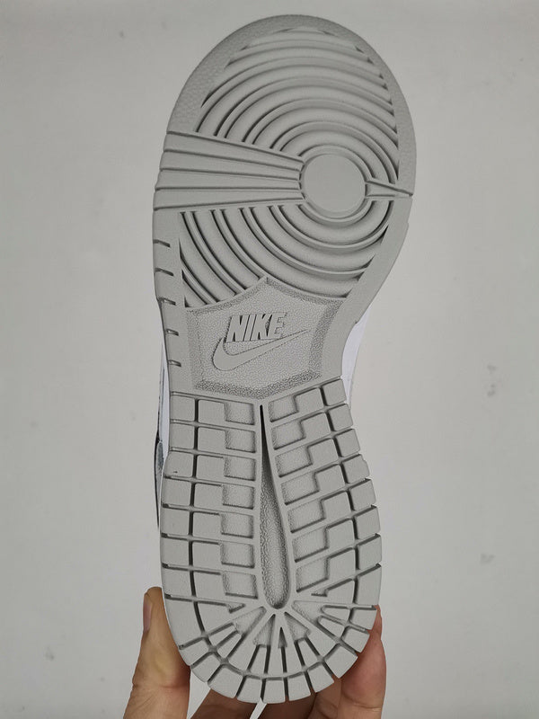 Side profile of Nike all-black sneakers everyday casual design