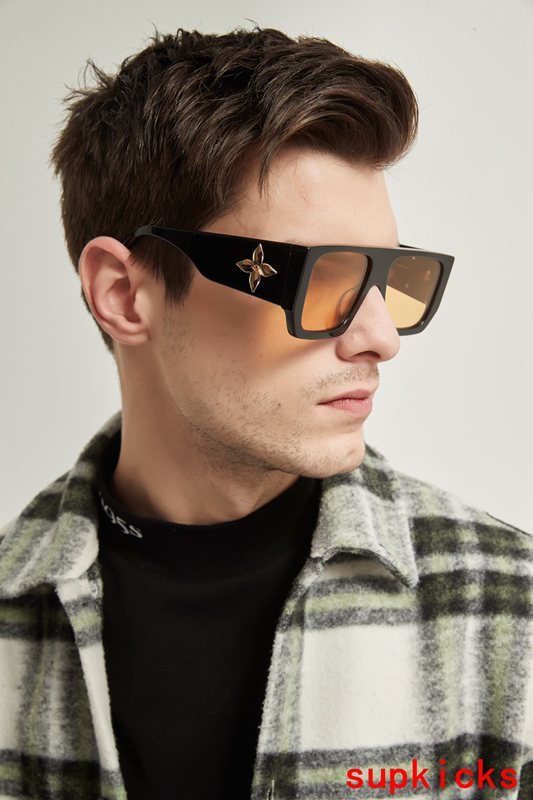 Close-up detail view of Louis Vuitton unisex sunglasses