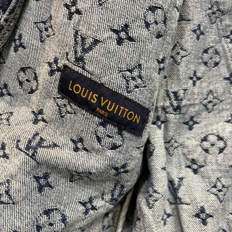 Close-up detail shot of Louis Vuitton luxury clothing with monogram-inspired silhouette