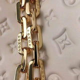 Handle and strap detail of statement elevated women's handbag – women's everyday handbag