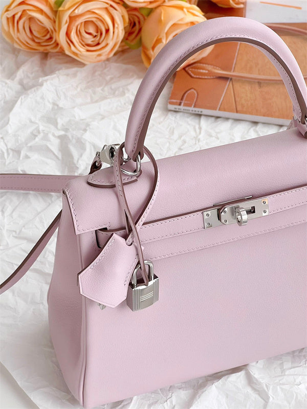  graceful top-handle bag styled with outfit