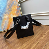 Handle and strap detail of refined elevated women's handbag – women's luxury accessory
