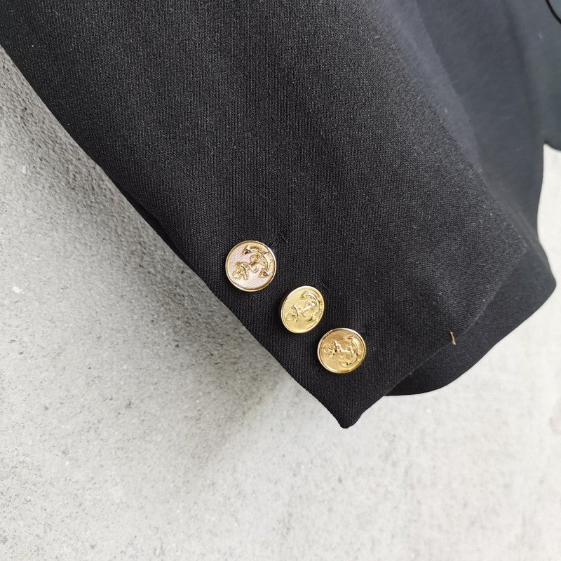 Front view of Louis Vuitton luxury clothing with logo-detail design