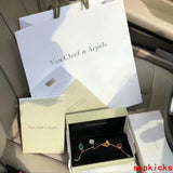 Side view of Van Cleef & Arpels unisex jewelry piece