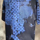 Close-up detail shot of Louis Vuitton cotton t-shirt with runway-inspired design