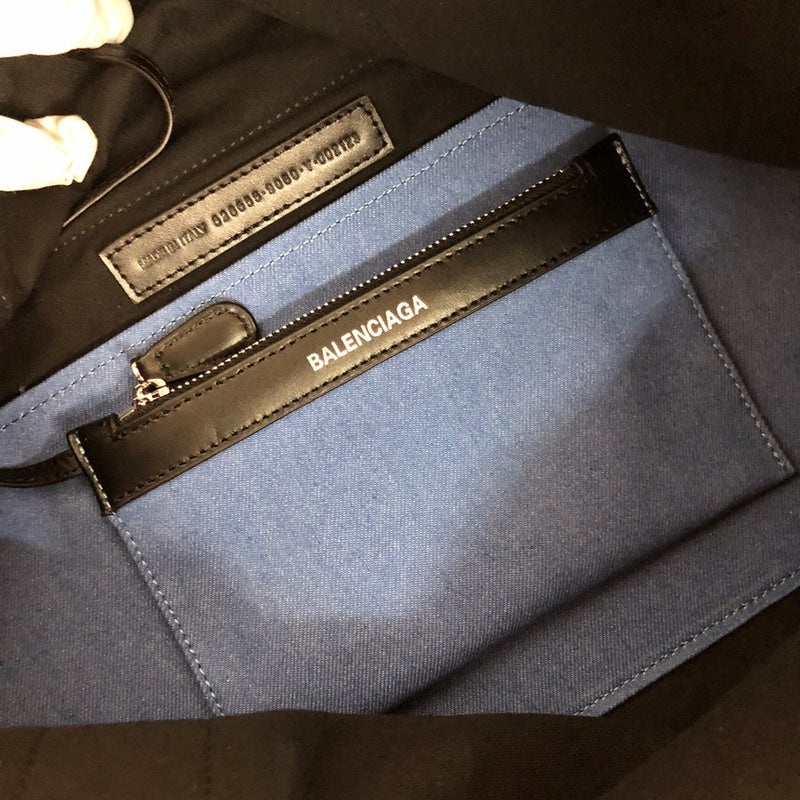 Side profile of elevated statement women's handbag – women's designer-style accessory