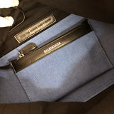 Side profile of elevated statement women's handbag – women's designer-style accessory