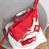 Styled lifestyle shot of polished statement women's handbag – women's designer-style accessory