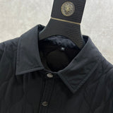 Close-up of Burberry designer clothing craftsmanship