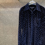 Back view of Louis Vuitton luxury clothing with everyday silhouette
