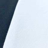 Side profile of Gucci luxury clothing with tailored silhouette