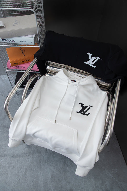 Close-up detail shot of Louis Vuitton luxury clothing with relaxed-fit cut