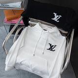 Close-up detail shot of Louis Vuitton luxury clothing with relaxed-fit cut