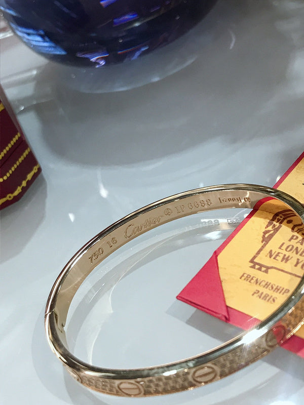 Angled view of Cartier unisex jewelry piece