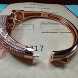 Close-up detail view of Cartier unisex jewelry piece