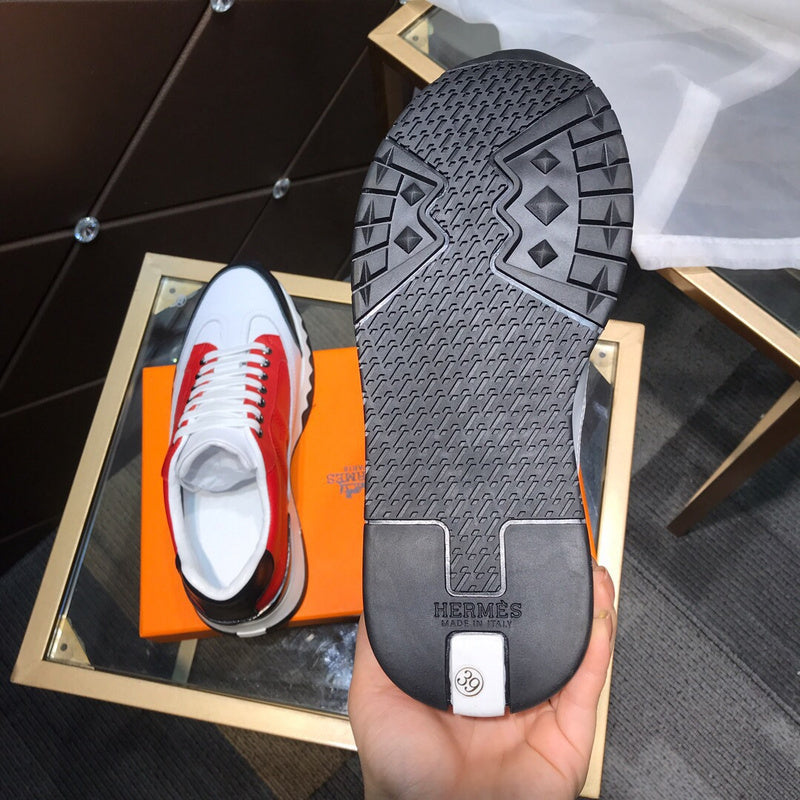 Hermès Red Slip-On Sneakers - Angled View