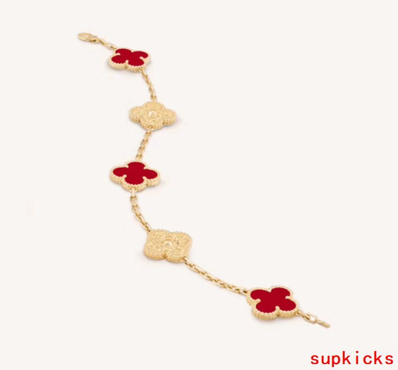 Lifestyle view of Van Cleef & Arpels unisex jewelry piece
