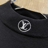 Flat lay presentation of Louis Vuitton luxury clothing with streetwear-inspired cut