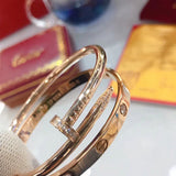 Close-up detail view of Cartier unisex jewelry piece
