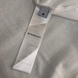 Side profile of Givenchy luxury clothing with tailored silhouette