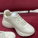 Gucci soft grey luxury sneakers view 4 premium leather build