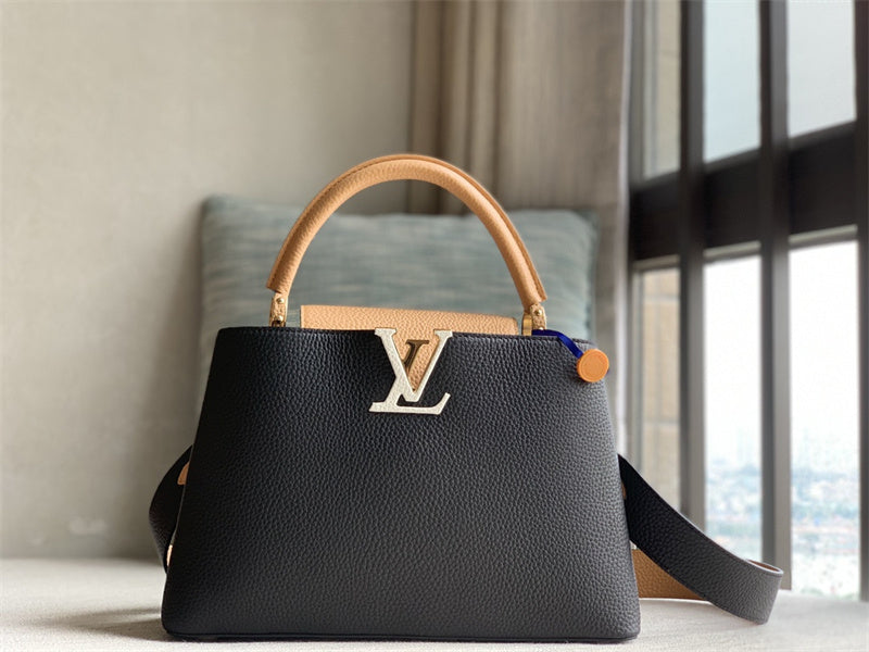  minimalist top-handle bag detail view showing craftsmanship
