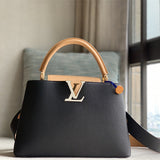  minimalist top-handle bag detail view showing craftsmanship