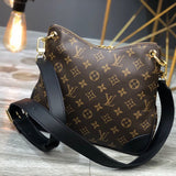 Close-up detail of polished structured women's handbag – women's luxury accessory
