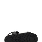 Close-up of Bottega Veneta sandals hardware and fine stitching