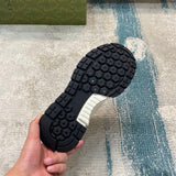 Side profile of Gucci tonal black sneakers premium leather build