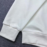 Close-up detail shot of Gucci luxury clothing with signature branding