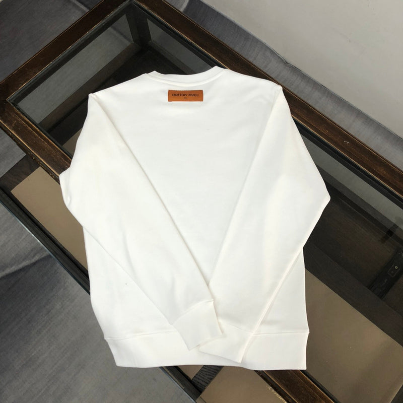 Close-up detail shot of Louis Vuitton luxury clothing with relaxed-fit cut