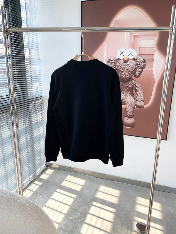 Full styled look of Gucci luxury clothing with monogram-inspired silhouette