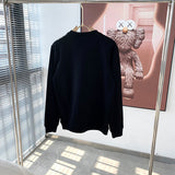 Full styled look of Gucci luxury clothing with monogram-inspired silhouette