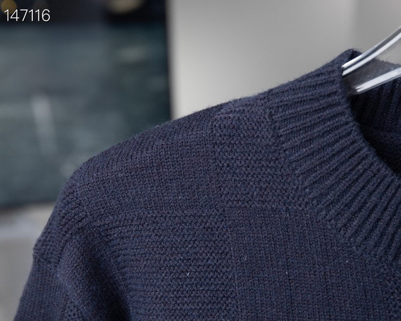 Close-up detail shot of Louis Vuitton luxury clothing with tailored silhouette