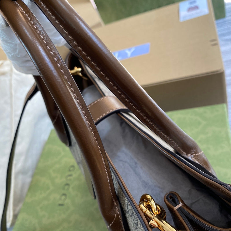 Styled lifestyle shot of polished everyday-luxe women's handbag – women's luxury accessory