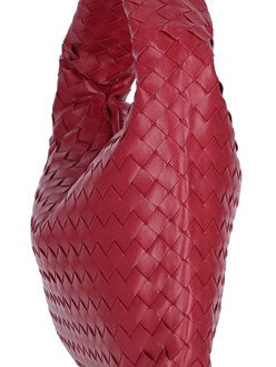 Close-up of Bottega Veneta shoulder bags hardware and fine stitching