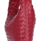 Close-up of Bottega Veneta shoulder bags hardware and fine stitching