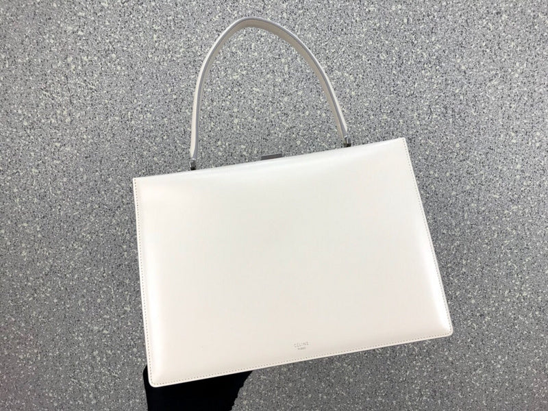 Side profile of refined classic women's handbag – women's everyday handbag