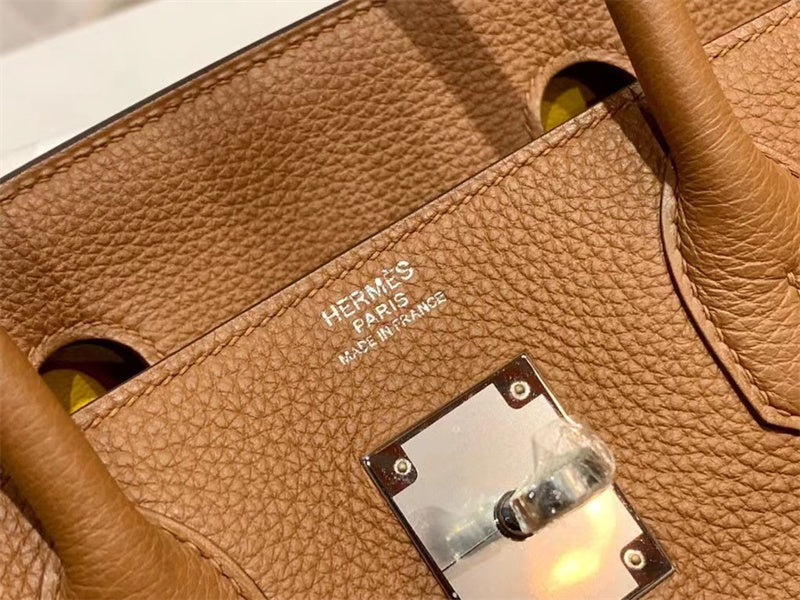 Side view of structured structured handbag