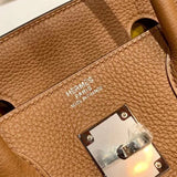 Side view of structured structured handbag