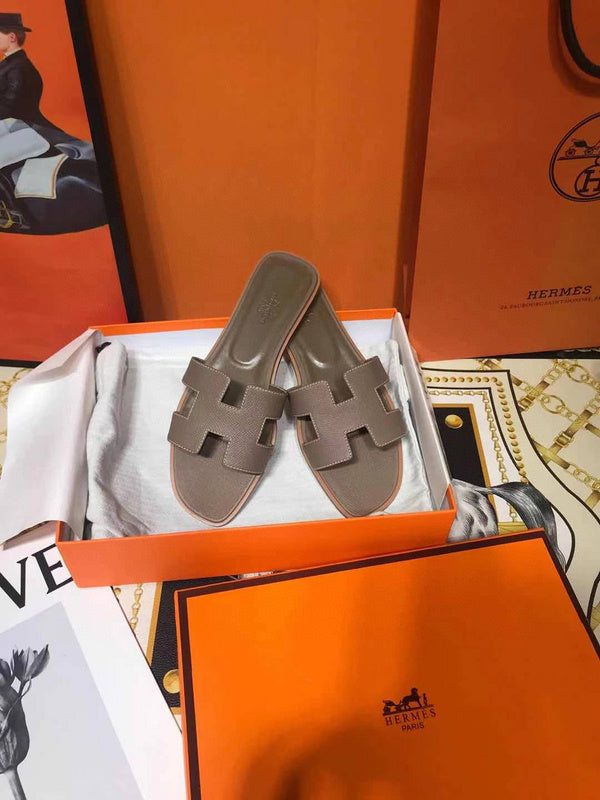 Hermes sandals Style 081 - styled lifestyle view