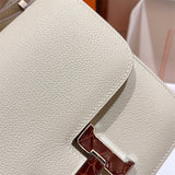  smart top-handle bag styled with outfit